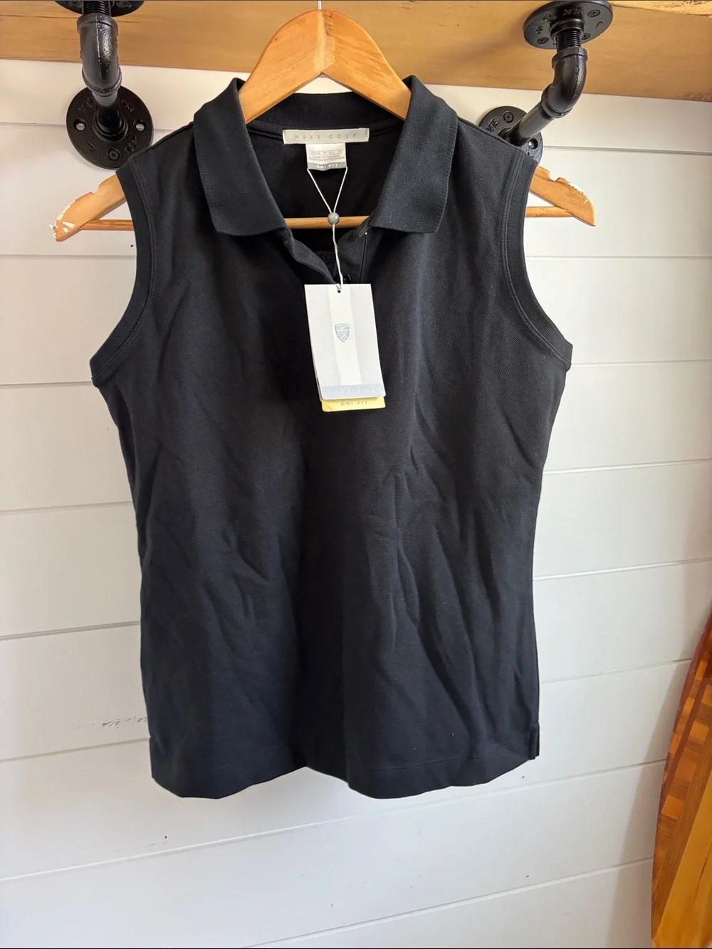Nike women’s Golf pique Black Sleeveless Polo Tank
